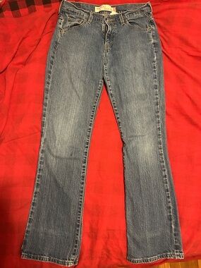 Levi's Boot Cut Jeans in Medium Blue Wash